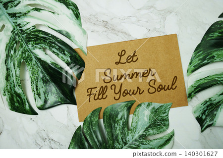 Let Summer Fill Your Soul text with monstera leave on marble background Let Summer Fill Your Soul text with monstera leave on marble background 140301627