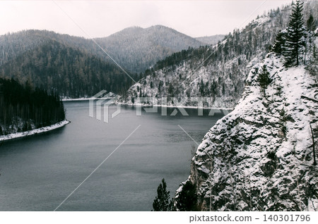 Krasnoyarsk Reservoir on Yenisei River, winter landscape on cloudy day Siberia 140301796