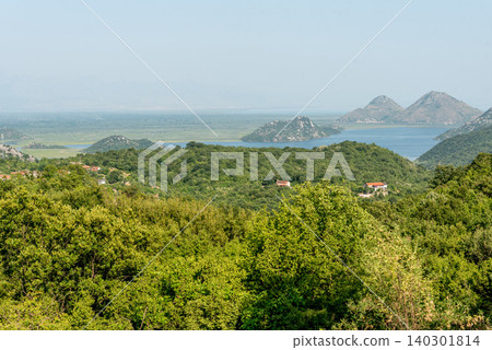 Skadar Lake in Montenegro, summer scenic waterscape pond on sunny day nature Skadar Lake in Montenegro, summer scenic waterscape pond on sunny day nature 140301814