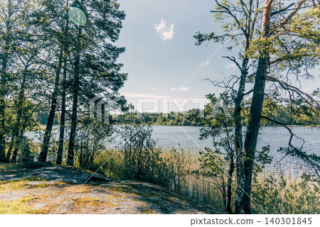 Landscape of summer river Vuoksa among stones, fast flow water reservoir Russia Landscape of summer river Vuoksa among stones, fast flow water reservoir Russia 140301845
