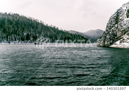 Krasnoyarsk Reservoir on Yenisei River, winter landscape on cloudy day Siberia Krasnoyarsk Reservoir on Yenisei River, winter landscape on cloudy day Siberia 140301897