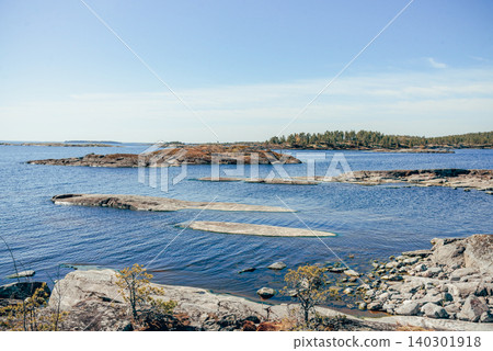 Landscape blue deep lake light sun, clouds sky mountains Ladoga skerries Karelia Landscape blue deep lake light sun, clouds sky mountains Ladoga skerries Karelia 140301918