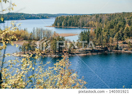 Landscape blue deep lake light sun, clouds sky mountains Ladoga skerries Karelia Landscape blue deep lake light sun, clouds sky mountains Ladoga skerries Karelia 140301921