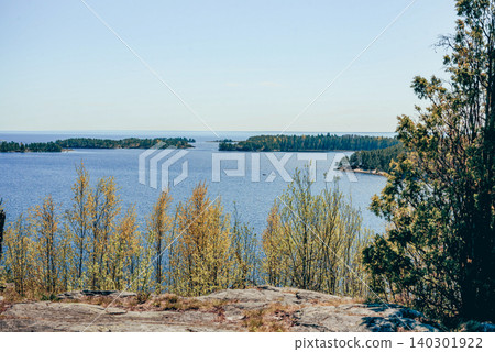 Landscape blue deep lake light sun, clouds sky mountains Ladoga skerries Karelia Landscape blue deep lake light sun, clouds sky mountains Ladoga skerries Karelia 140301922