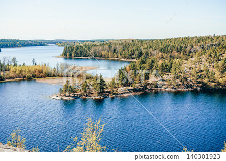 Landscape blue deep lake light sun, clouds sky mountains Ladoga skerries Karelia Landscape blue deep lake light sun, clouds sky mountains Ladoga skerries Karelia 140301923