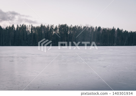 Winter landscape of icy frozen lake Yastrebinnoye in Leningrad region of Russia Winter landscape of icy frozen lake Yastrebinnoye in Leningrad region of Russia 140301934