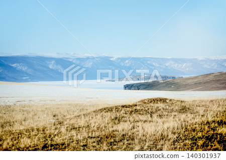 Winter landscape of icy frozen lake water Baikal in Siberia of Russia outdoor Winter landscape of icy frozen lake water Baikal in Siberia of Russia outdoor 140301937