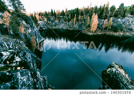 Granite marble quarry with Lake Ruskeala in Karelia, Russia, summer landscape Granite marble quarry with Lake Ruskeala in Karelia, Russia, summer landscape 140301959