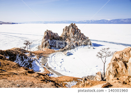 Shaman Rock on Lake Baikal Siberia Russia, winter landscape of frozen ice pond Shaman Rock on Lake Baikal Siberia Russia, winter landscape of frozen ice pond 140301960