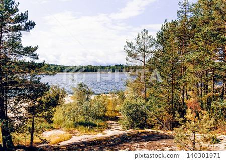 Landscape blue deep lake light sun, clouds sky mountains Ladoga skerries Karelia Landscape blue deep lake light sun, clouds sky mountains Ladoga skerries Karelia 140301971