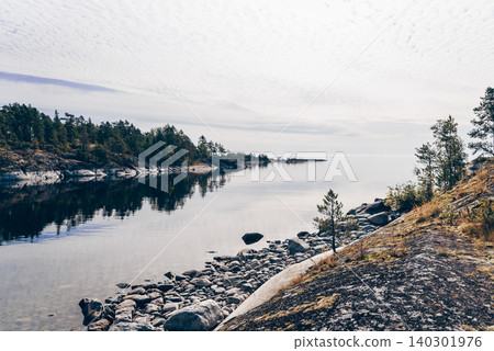 Landscape blue deep lake light sun, clouds sky mountains Ladoga skerries Karelia Landscape blue deep lake light sun, clouds sky mountains Ladoga skerries Karelia 140301976