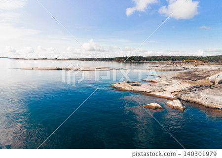 Landscape blue deep lake light sun, clouds sky mountains Ladoga skerries Karelia Landscape blue deep lake light sun, clouds sky mountains Ladoga skerries Karelia 140301979