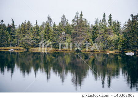 Lake on top of Mount Vottovaara in Karelia Russia, summer landscape cloudy day 140302002