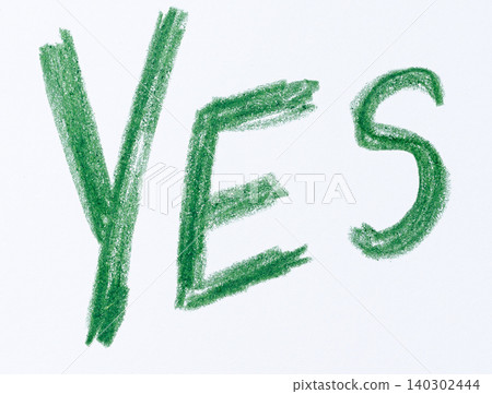 Word YES written in capital letters in green pencil on a white background Word YES written in capital letters in green pencil on a white background 140302444