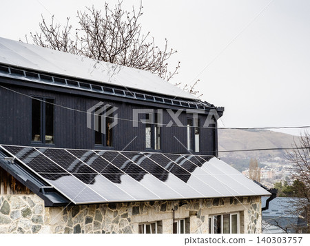 solar panels on the roof of residential building solar panels on the roof of residential building 140303757