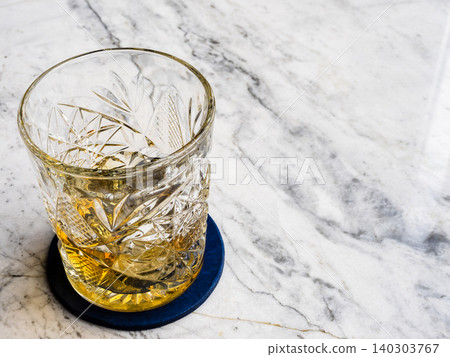 shot of whiskey on rock in Old Fashioned glass shot of whiskey on rock in Old Fashioned glass 140303767