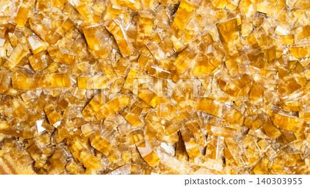 surface of crystalline yellow baryte rock 140303955