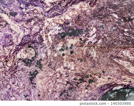 surface of polished charoite rock close-up 140303998