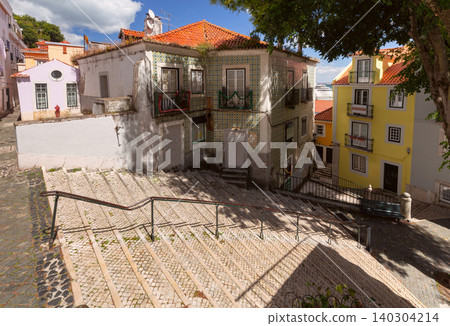Traditional Houses and Stone Stairway in Alfama District Lisbon Portugal Traditional Houses and Stone Stairway in Alfama District Lisbon Portugal 140304214