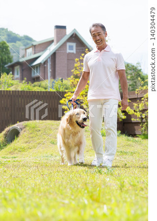 Senior men taking a walk of a dog Senior men taking a walk of a dog 140304479