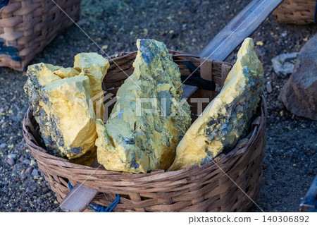 Pieces of raw Sulfur after mining from Kawah Ijen, an active volcano in East Java, Indonesia. Pieces of raw Sulfur after mining from Kawah Ijen, an active volcano in East Java, Indonesia. 140306892