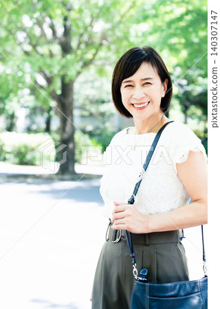 middle-aged women commuting to work middle-aged women commuting to work 140307147