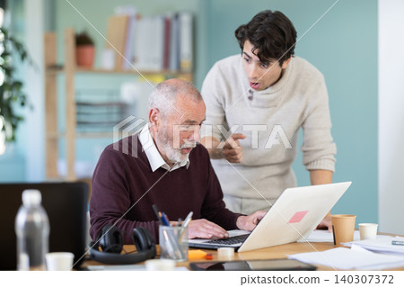 Happy male managers celebrate business success. Winning stock exchange bid Happy male managers celebrate business success. Winning stock exchange bid 140307372