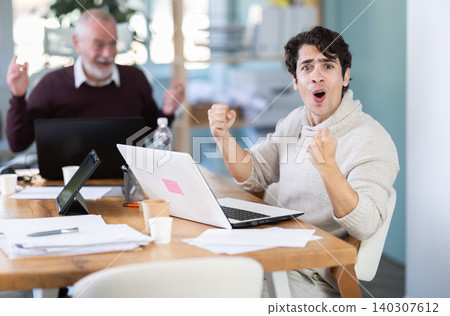 Men office employees is genuinely happy and elated Men office employees is genuinely happy and elated 140307612