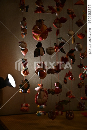 Hanging dolls illuminated by light Hanging dolls illuminated by light 140308265