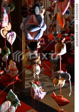 A mouse made of crepe fabric adorning a hanging hina doll display. A mouse made of crepe fabric adorning a hanging hina doll display. 140308268