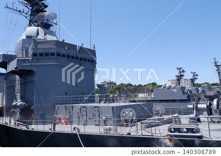 The test ship Asuka is docked at Yokosuka Base. The test ship Asuka is docked at Yokosuka Base. 140308789