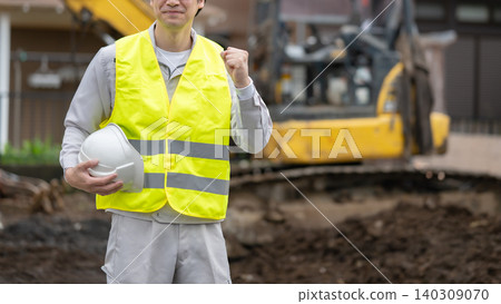 Workers working in the field Workers working in the field 140309070