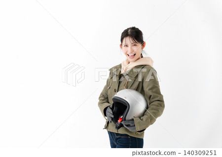 A woman with a helmet A woman with a helmet 140309251