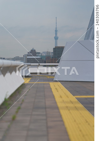 Tokyo Skytree seen from behind tactile paving blocks Tokyo Skytree seen from behind tactile paving blocks 140309766