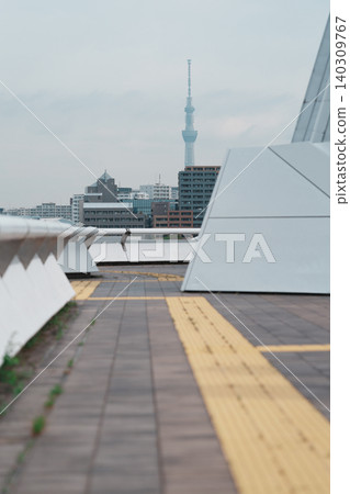 Tokyo Skytree seen from behind tactile paving blocks Tokyo Skytree seen from behind tactile paving blocks 140309767