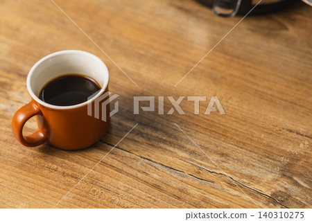 Enjoying hot coffee during a quiet morning at home Enjoying hot coffee during a quiet morning at home 140310275