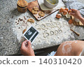 Pregnant woman announcing baby with ultrasound and baking ingredients 140310420