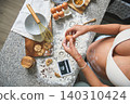 Pregnant woman creating cookies with baby ultrasound 140310424