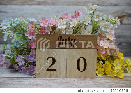 Wooden Calendar Showing the Date of July 20th. Day 20 of July month 140310756