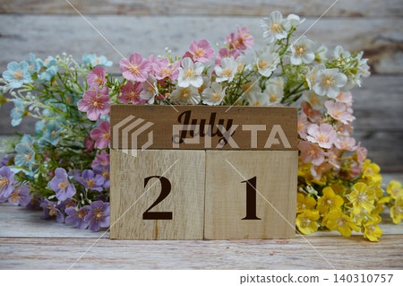 Wooden Calendar Showing the Date of July 21th. Day 21 of July month Wooden Calendar Showing the Date of July 21th. Day 21 of July month 140310757