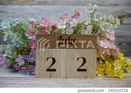 Wooden Calendar Showing the Date of July 22th. Day 22 of July month 140310758