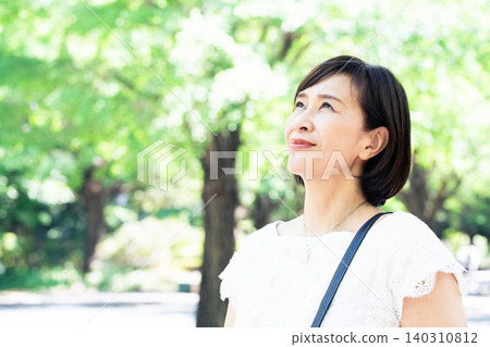middle-aged women commuting to work 140310812