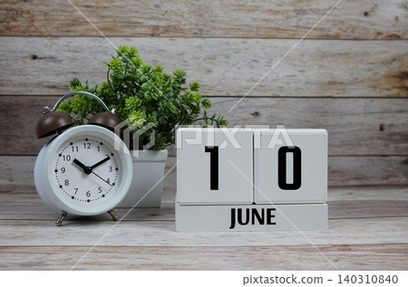 Wooden Calendar Showing the Date of June 10th. Day 10 of June Month Wooden Calendar Showing the Date of June 10th. Day 10 of June Month 140310840