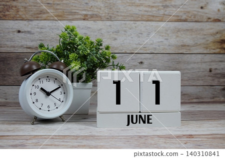 Wooden Calendar Showing the Date of June 11th. Day 11 of June Month Wooden Calendar Showing the Date of June 11th. Day 11 of June Month 140310841