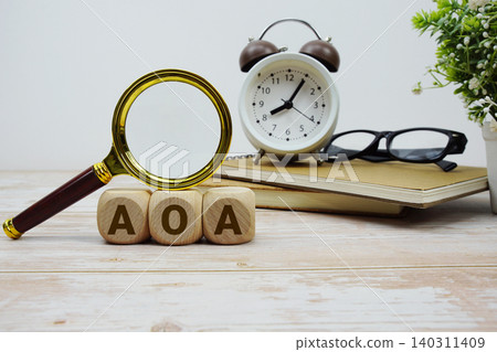 AOA Articles of Association alphabet letters with magnifying glass and alarm clock AOA Articles of Association alphabet letters with magnifying glass and alarm clock 140311409