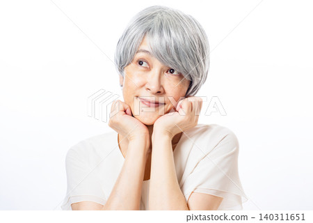 A senior woman with gray hair who dreams A senior woman with gray hair who dreams 140311651