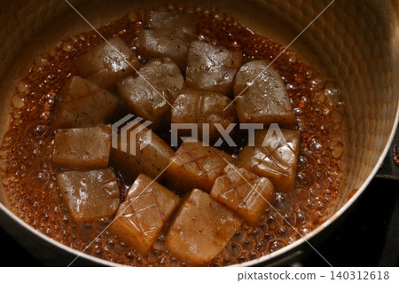 Thunder konjac being cooked Thunder konjac being cooked 140312618