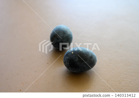 Black sphere on the table 140313412