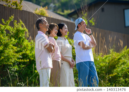 People looking into the distance amidst the greenery People looking into the distance amidst the greenery 140313476
