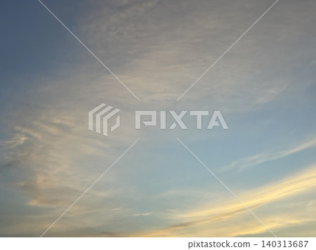 Cirrus Clouds In Blue Sky At Sunset Low Angle View Cirrus Clouds In Blue Sky At Sunset Low Angle View 140313687
